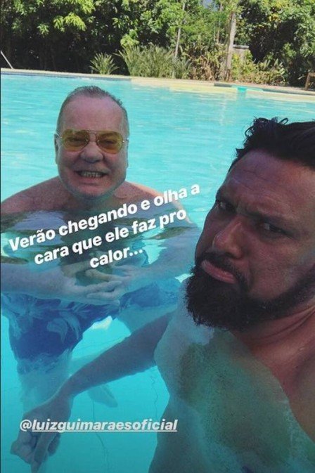 luiz fernando guimarães e marido na piscina